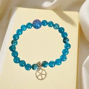Hand Crafted Turquoise Blue Beaded Bracelet with Silver Gear Charm